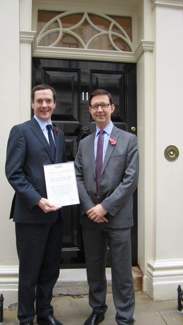 Miles Beale, the chief executive of the WSTA, presented The Chancellor of the Exchequer, George Osbourne an award